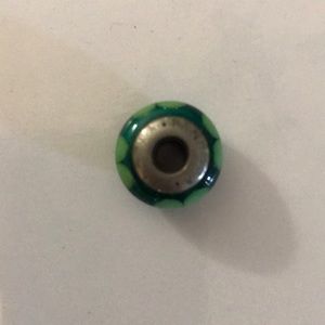 Green 4 leaf clover Pandora charm.